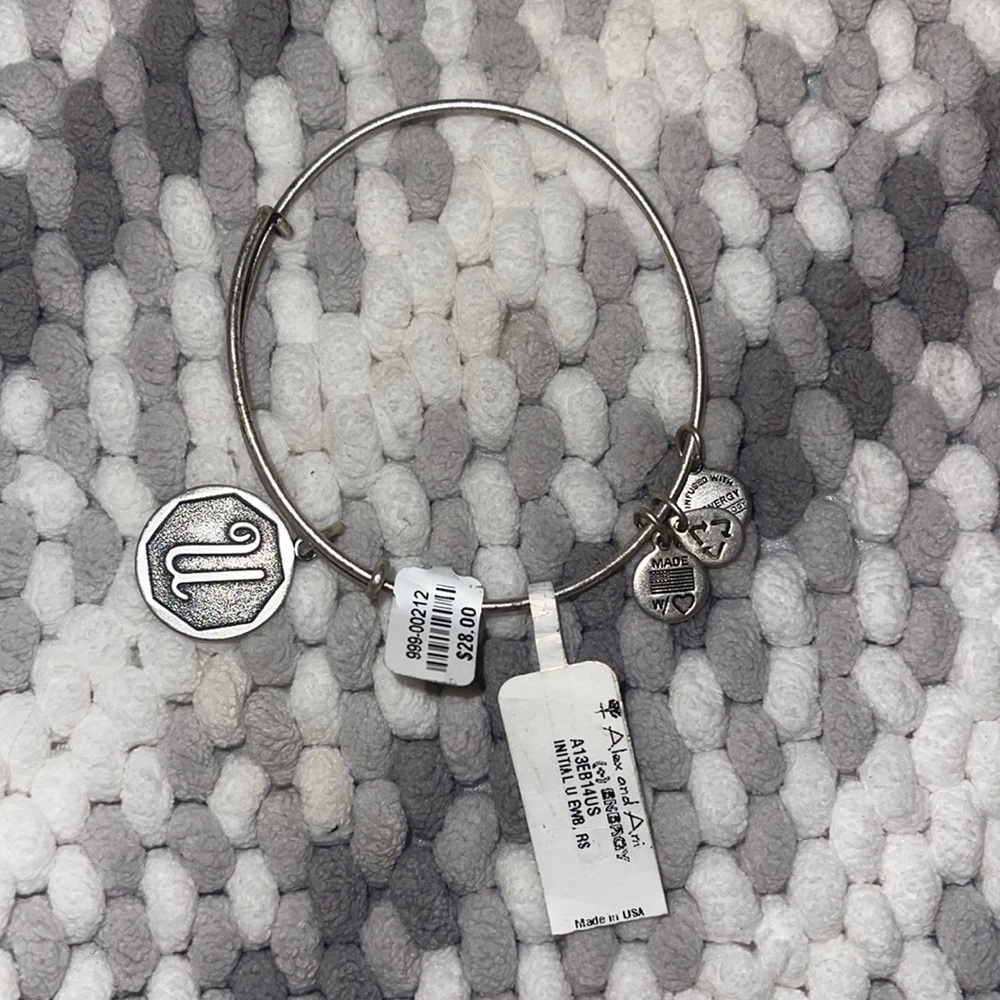 Free with any purchase 10$ or more Alex and Ani initial bracelet. Silver  “U”